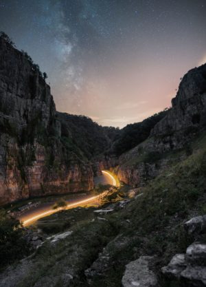 A fine art astrophotography print of light trails and the Milky Way at Cheddar Gorge in Somerset